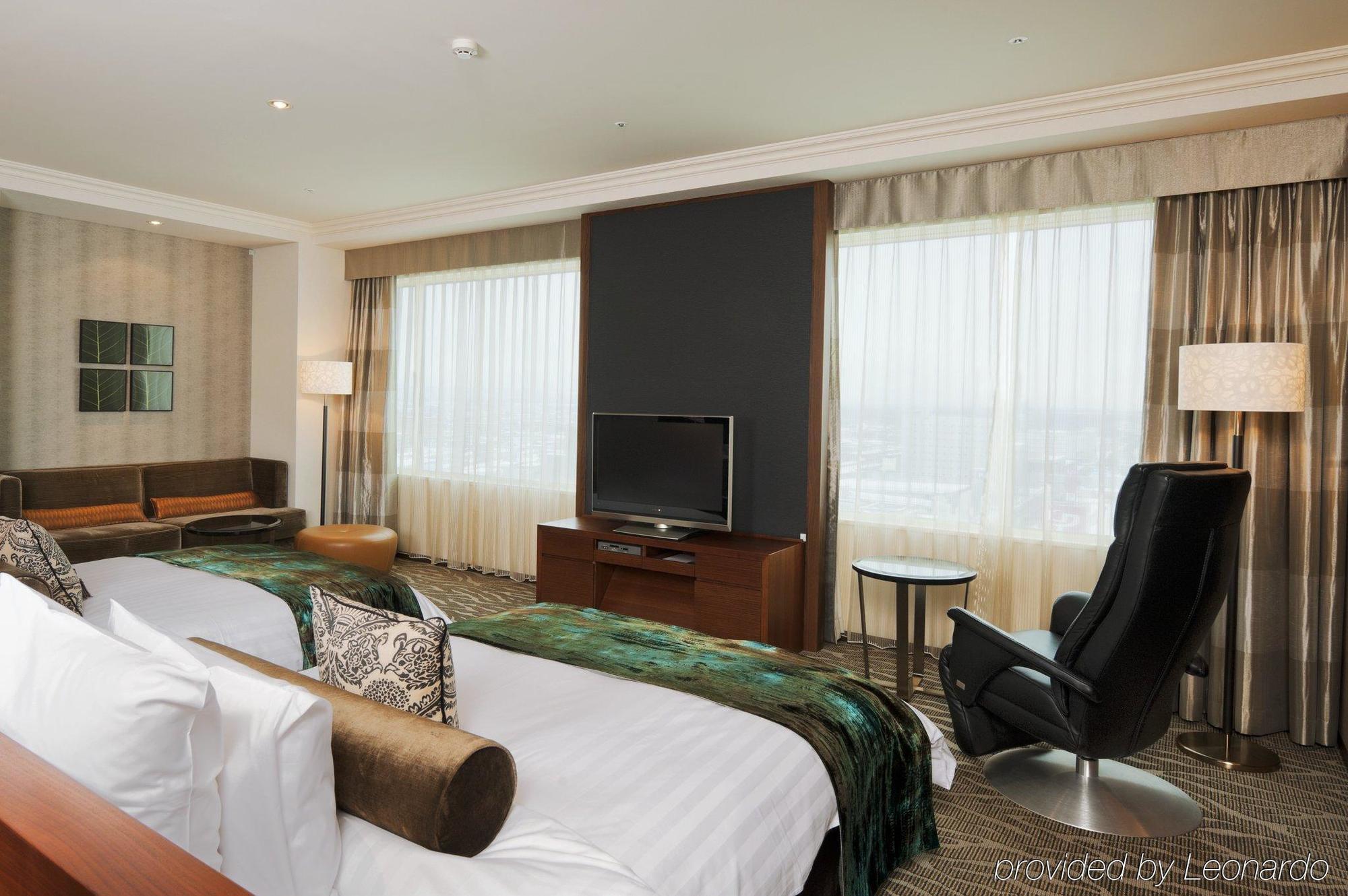 Hotel Ana Crowne Plaza Chitose By Ihg Zimmer foto A suite at the hotel